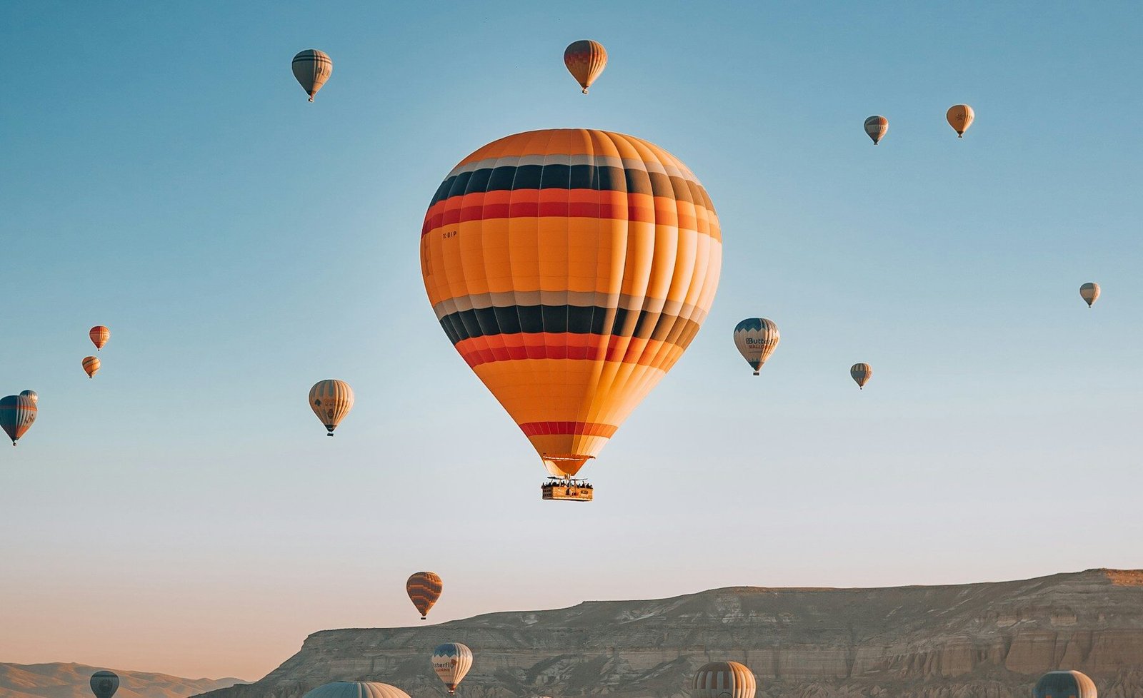 A hot-air balloon flying over Cappadocia, Türkiye