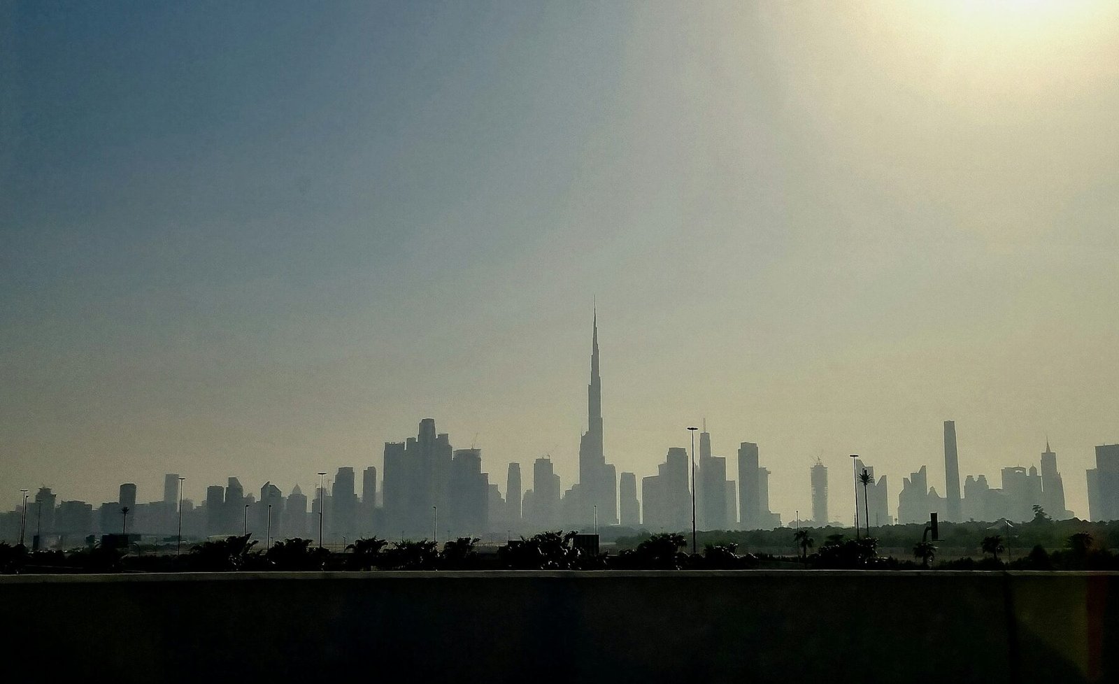 The Dubai skyline reflected across the water