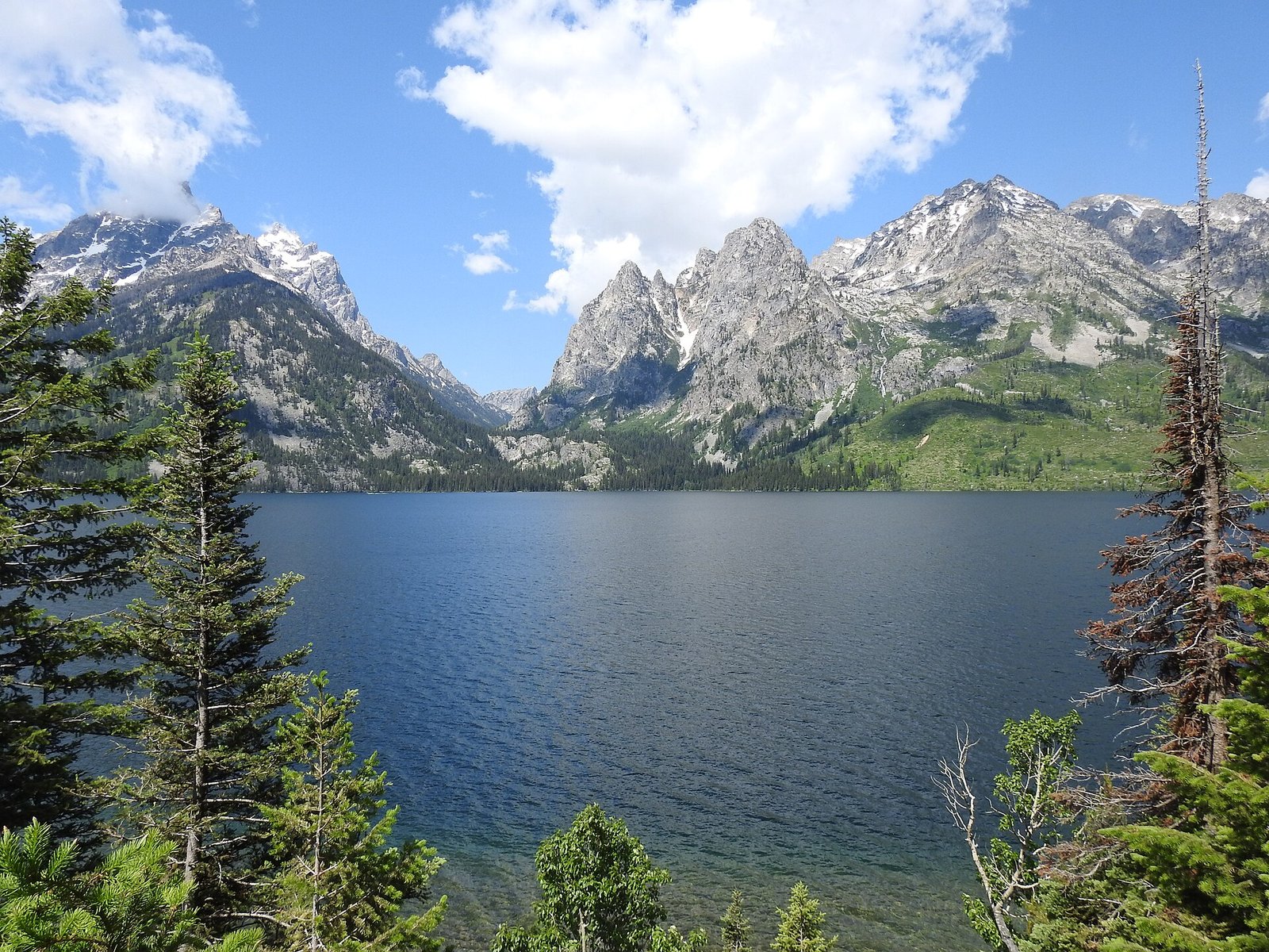 Teton peaks reflected in a mountain lake