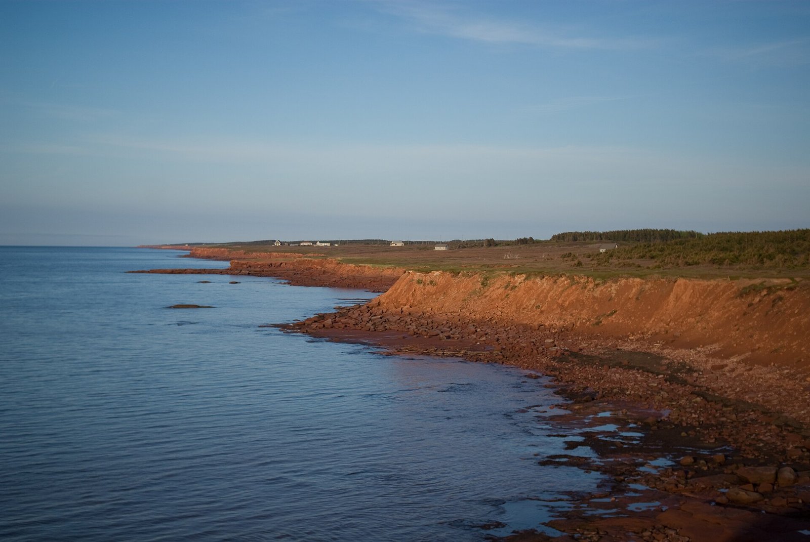 Red sandstone cliffs above the Gulf