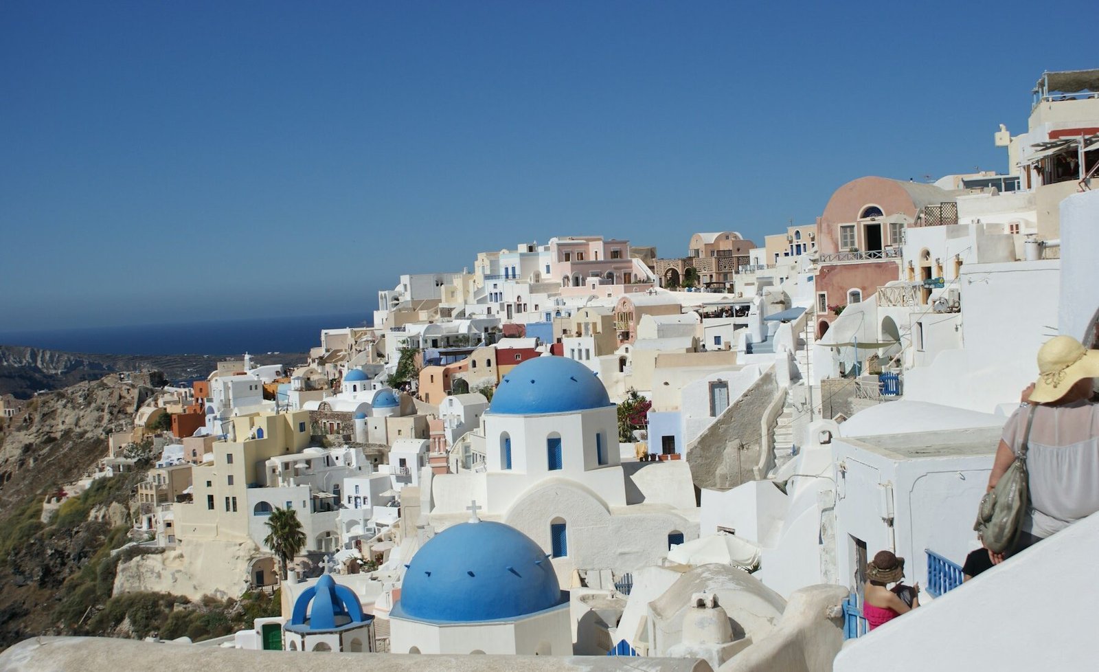 Blue-domed churches overlooking the Aegean Sea in Santorini