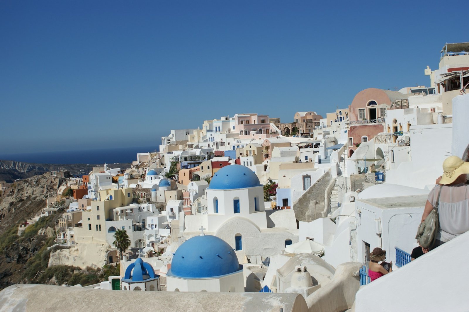 Blue-domed churches overlooking the Aegean Sea in Santorini