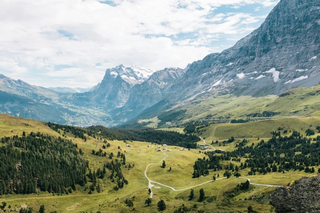 The green Lauterbrunnen Valley beneath the Swiss Alps