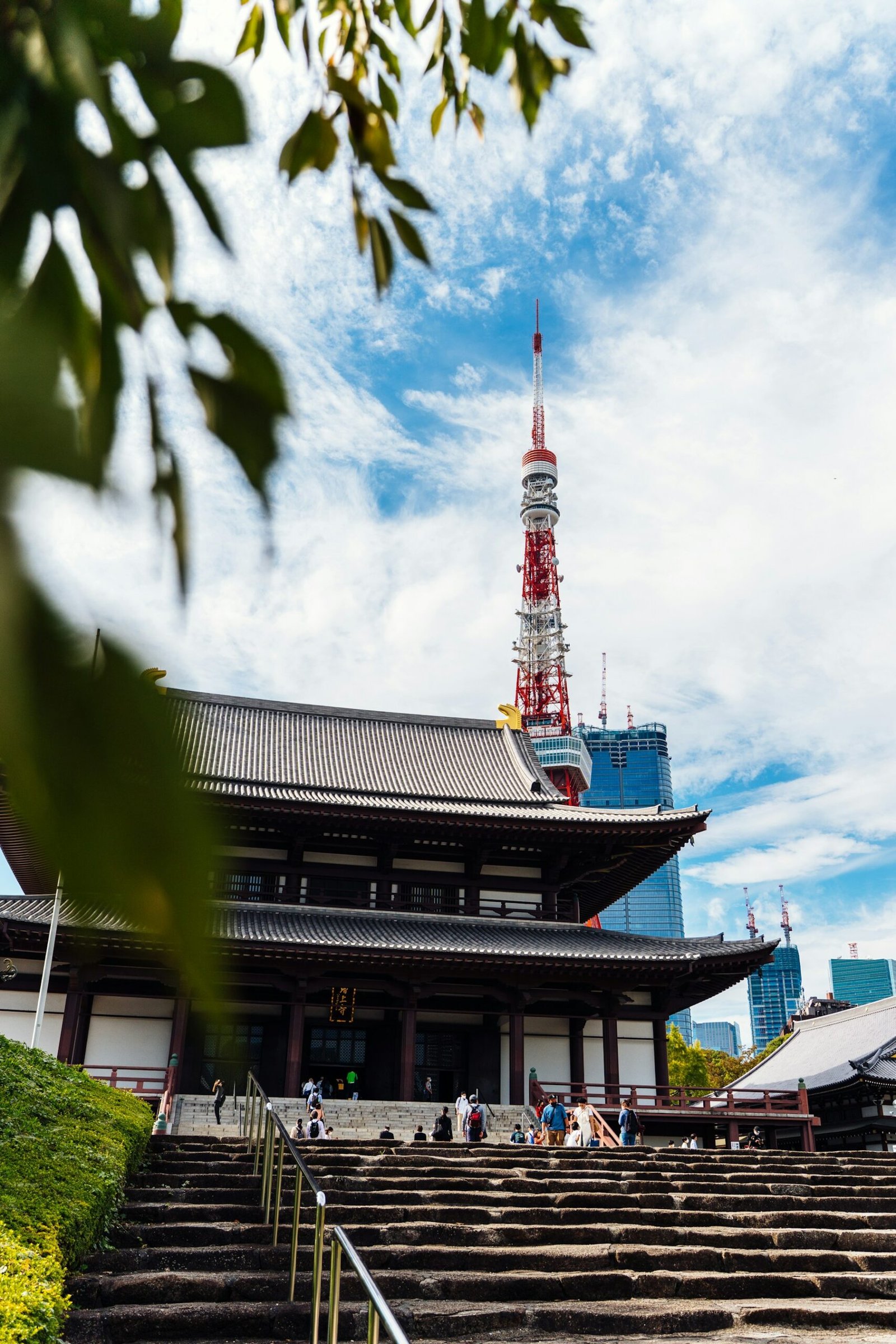 A traditional temple framed by Tokyo Tower