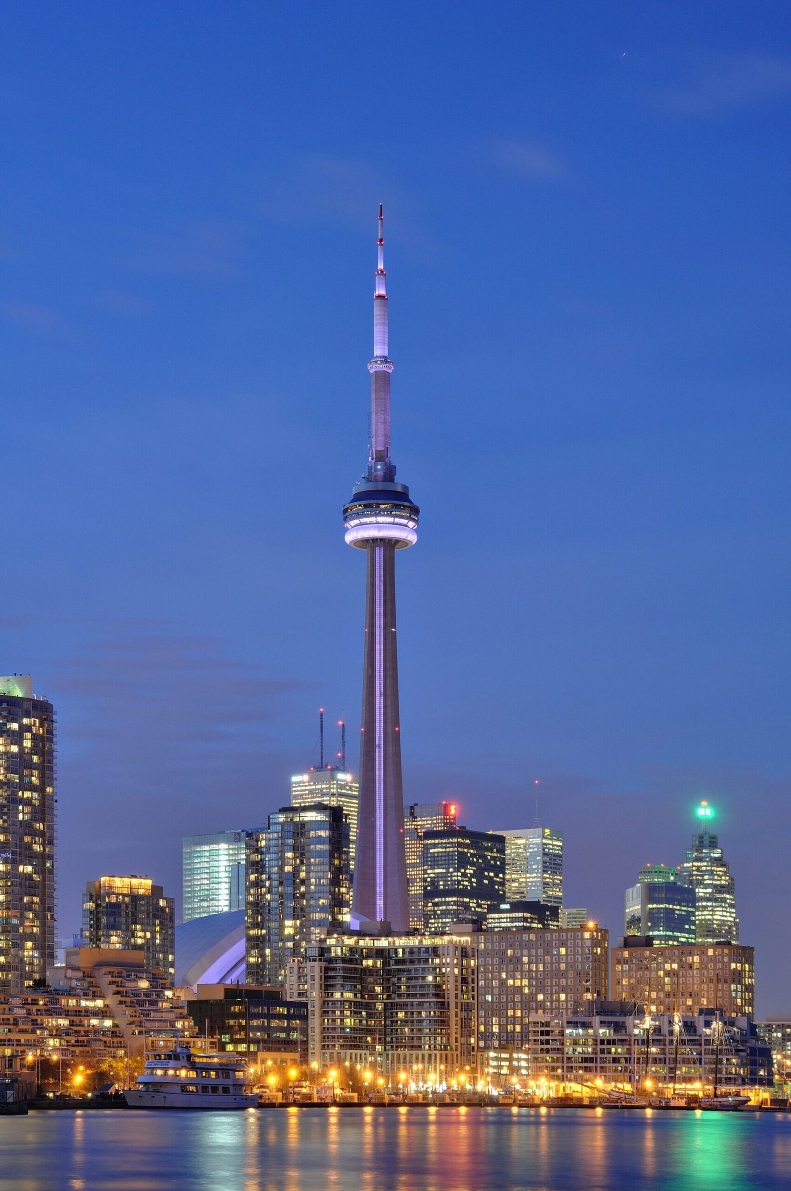 Toronto skyline and CN Tower beside Lake Ontario