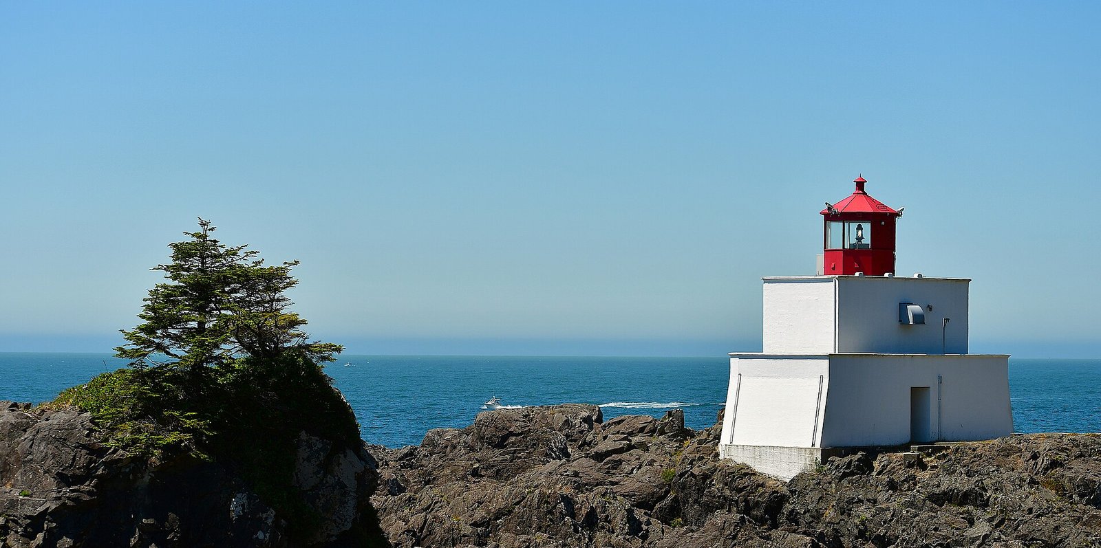 Amphitrite Point lighthouse above the ocean